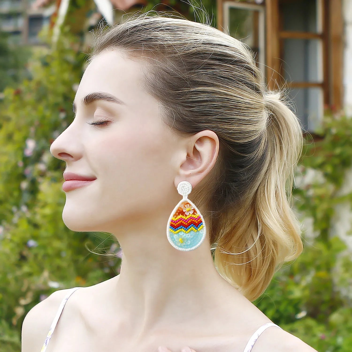 Hand-woven beaded drop earrings in geometric Easter egg shape, colour E69066, 6.7cm by 3.7cm