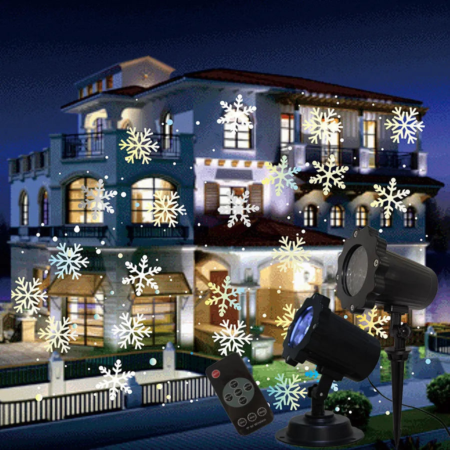 LED Christmas snowflake laser projector with white snowfall pattern on a garden lawn at night