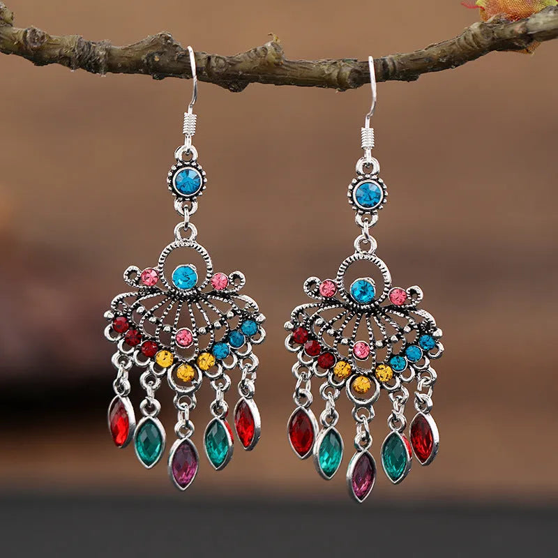 Purple water drop shaped retro earrings with long fringe detailing and ethnic style elements