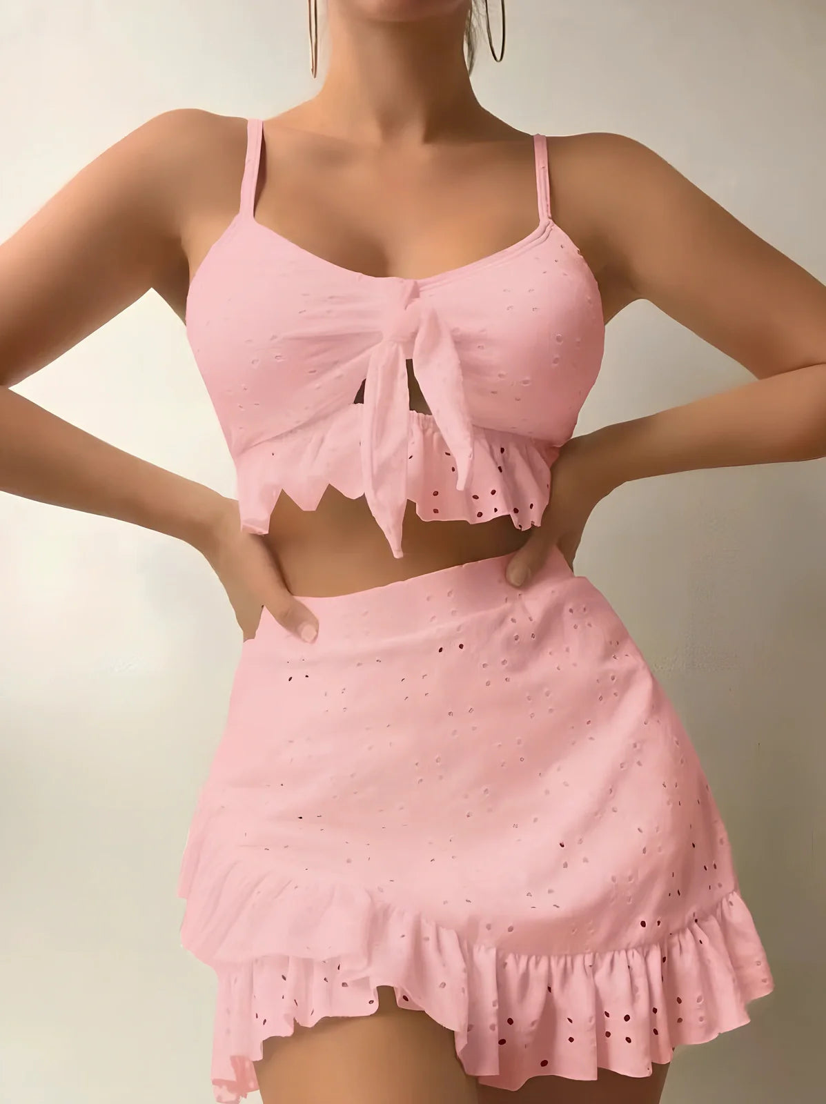 Women's 3-piece bikini set with hip-hugging skirt and ruffle detailing in polyester swimwear