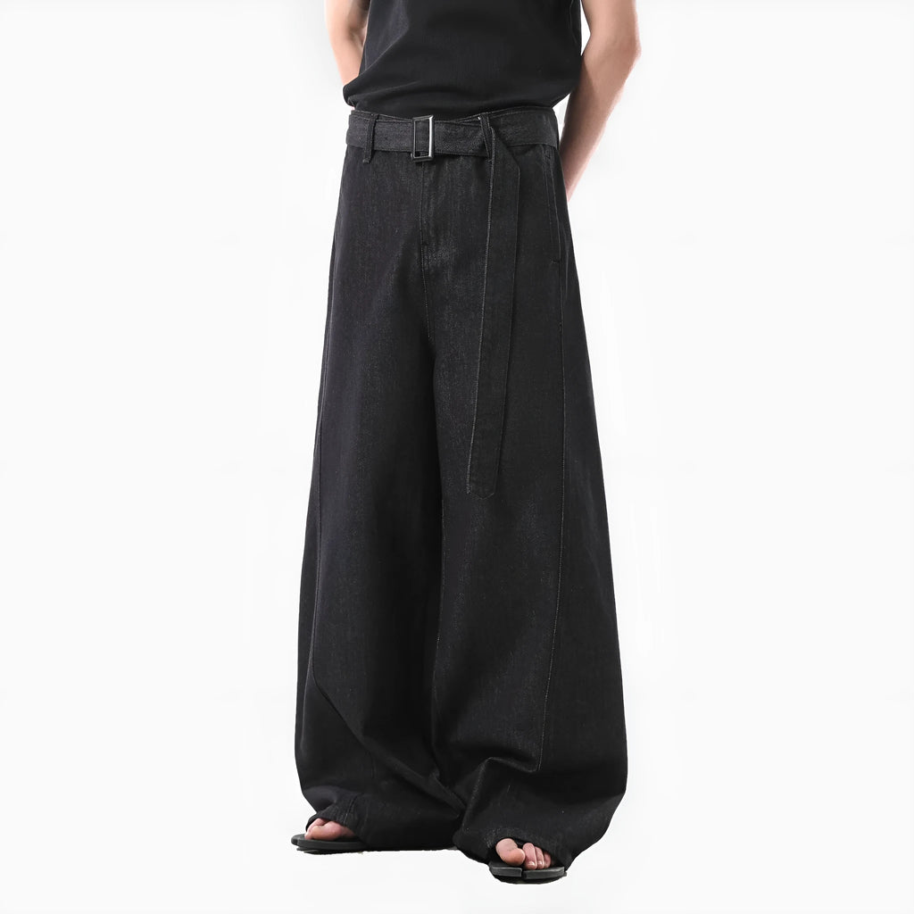 Black women's high-waist straight-leg jeans with gold stitching and a zip fly closure.