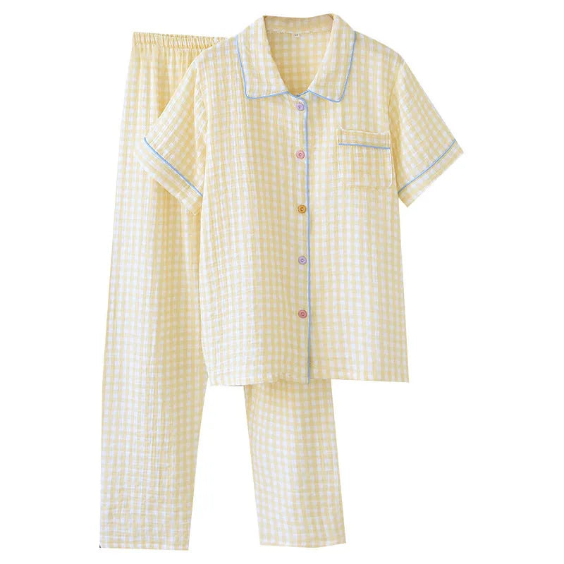 Women's loose-fit short-sleeved trousers and top in washed cotton gauze, shown in a floral or plaid pattern.