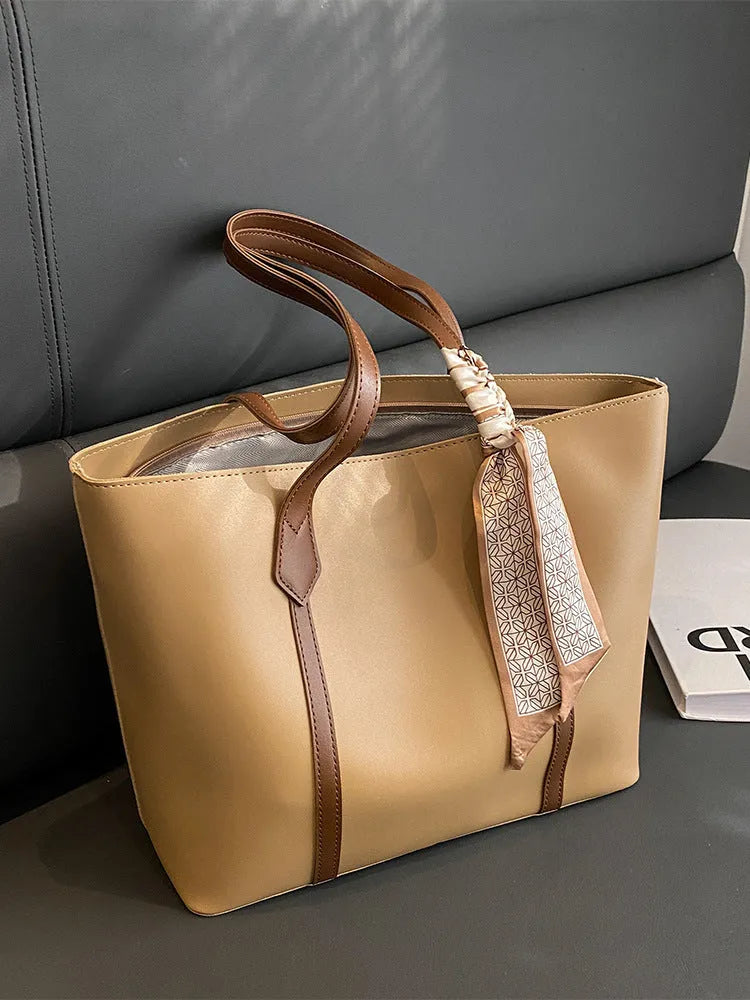 Women's large capacity tote shoulder bag in multiple colour options showing bucket design with sandwich pocket