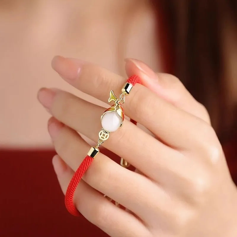 Women's lucky koi red rope bracelet and matching copper necklace set in retro style.