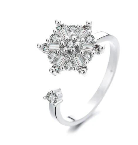 Adjustable rotating spinner ring with elegant flower and bee design in various color options