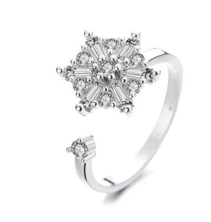Adjustable rotating spinner ring with elegant flower and bee design in various color options