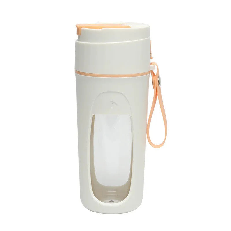 Fresh Orange portable USB blender with borosilicate glass cup on a table