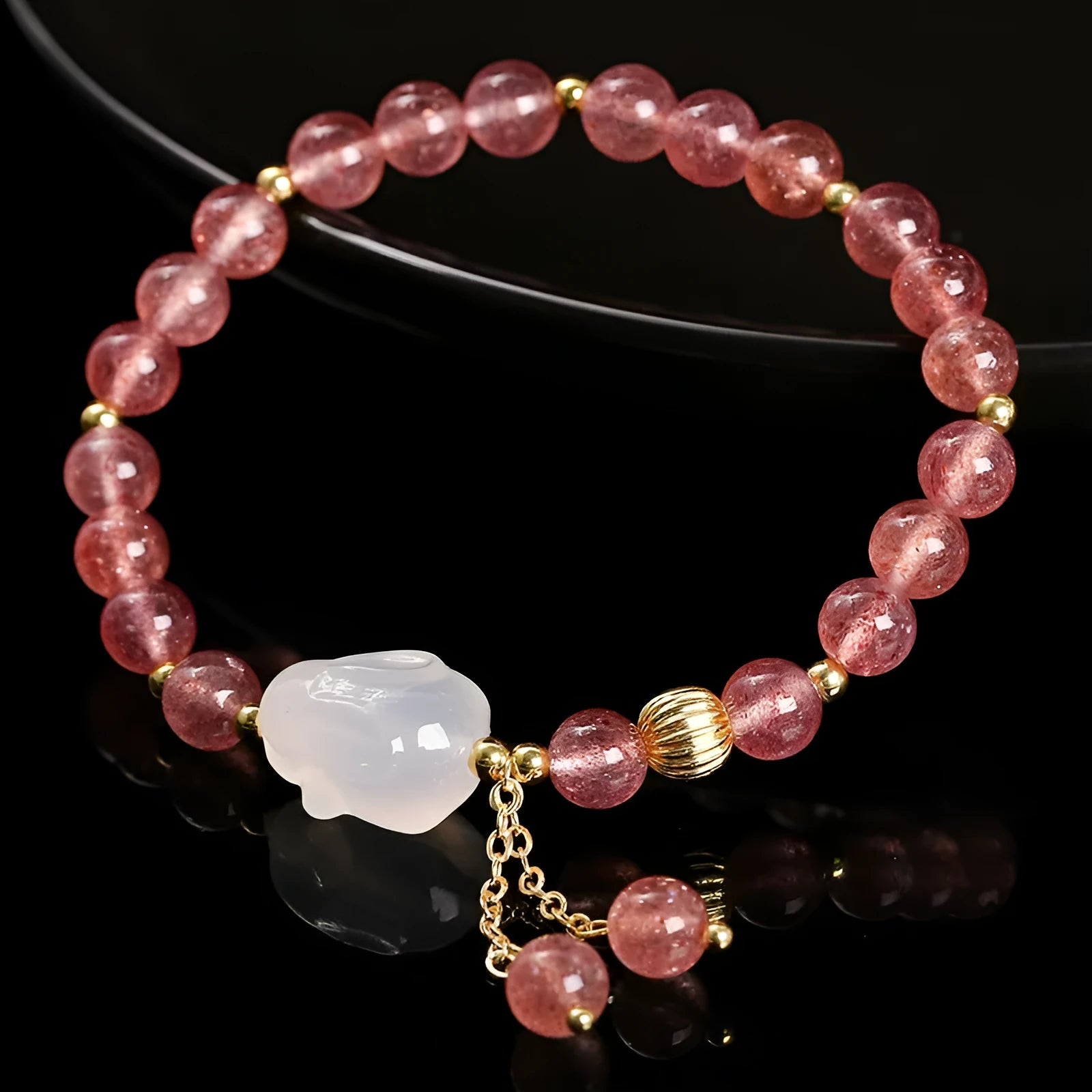 Women's strawberry quartz agate bracelet with 6mm geometric beads and White Rabbit design