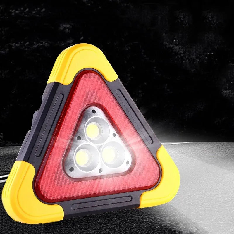 Car mounted tripod warning sign light with solar panel, large and small sizes, showing warning flash mode on a roadside