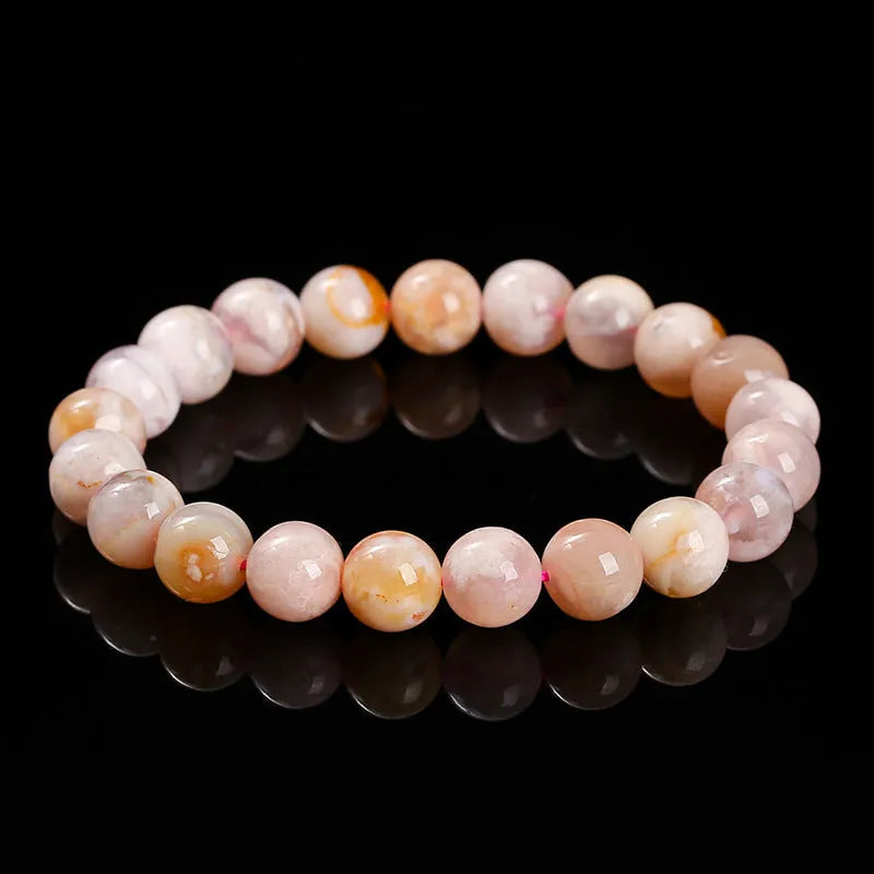 Natural cherry agate sweet style bracelet with geometric round beads in three purity sizes