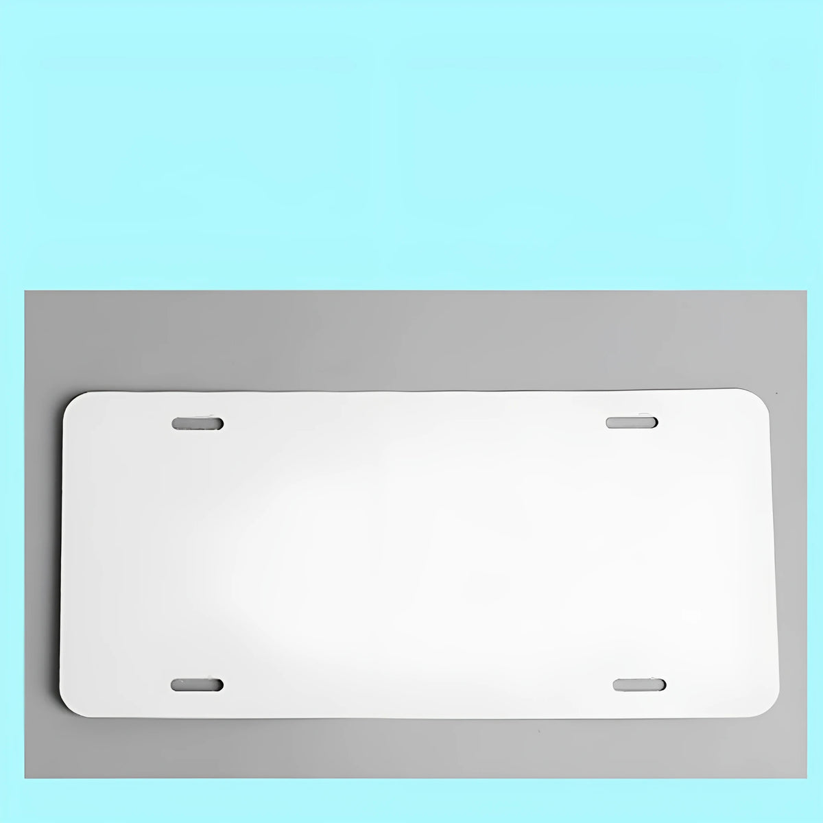 White aluminium licence plate blank sheet measuring 30.3 by 15 centimetres.