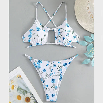 Women's floral pattern tie-neck triangle swimsuit with matching shorts on mannequin