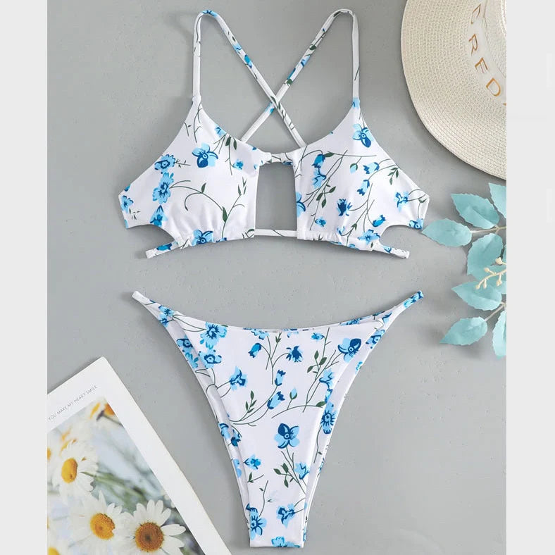 Women's floral tie-neck triangle swimsuit with matching shorts, featuring a polyester fabric that dries quickly and provides UPF 50+ sun protection for swimming and water sports activities