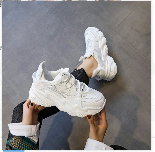Women's black thick sole casual shoes with round toe and cow leather upper on white background