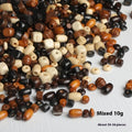 Scattered vintage solid wood beads in mixed colours for DIY jewellery making.