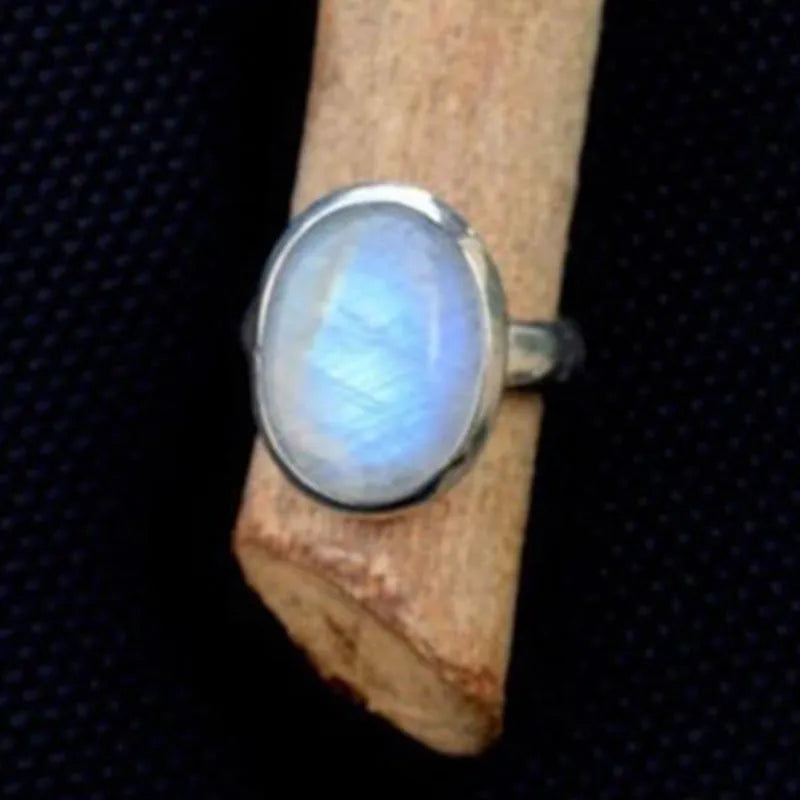 Vintage Thai silver moonstone ring with flower design in silver colour on alloy base