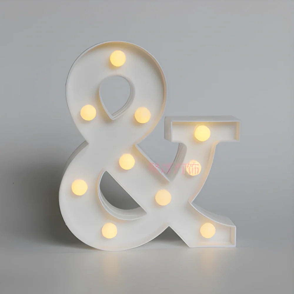 White plastic LED alphabet marquee sign with warm white illumination, 22cm height with battery operation