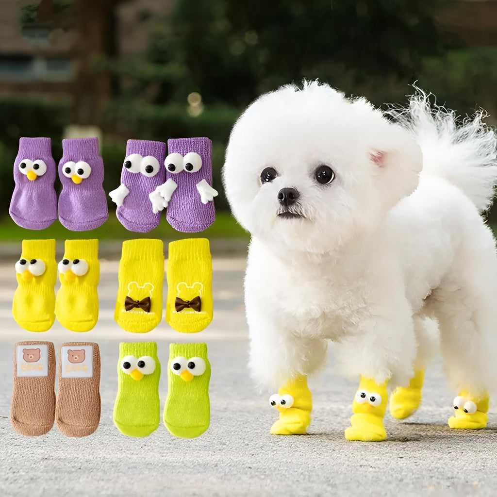 Dog all-season universal cotton socks with cute big eyes, anti-slip sole, green colour, side view on wooden floor