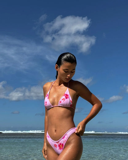 Women's floral print split swimsuit in polyester fabric, available in orange, light blue, pink, and yellow colours