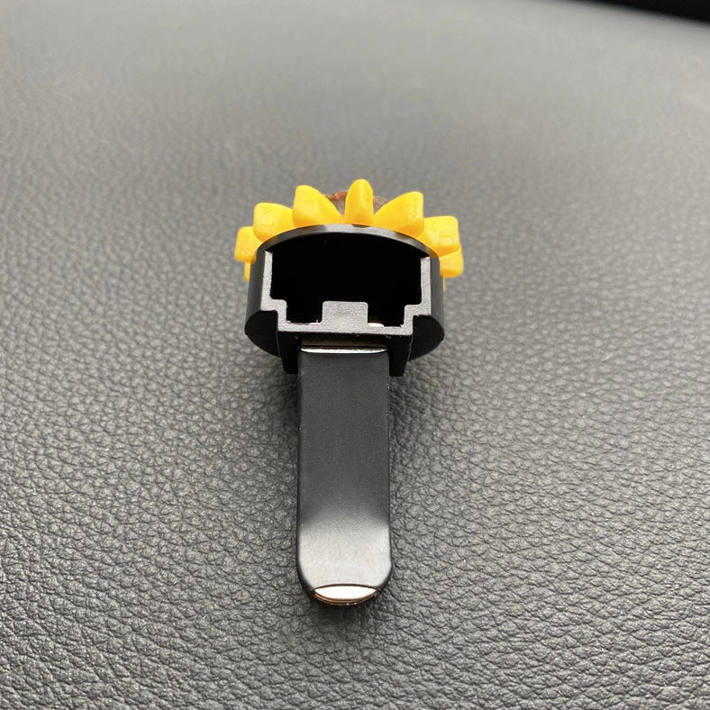 Yellow sunflower car vent perfume clip measuring 8cm with secure mounting clip for air freshening