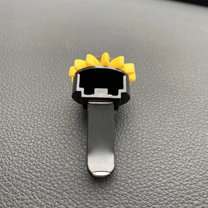 Yellow sunflower car vent perfume clip measuring 8cm with secure mounting clip for air freshening