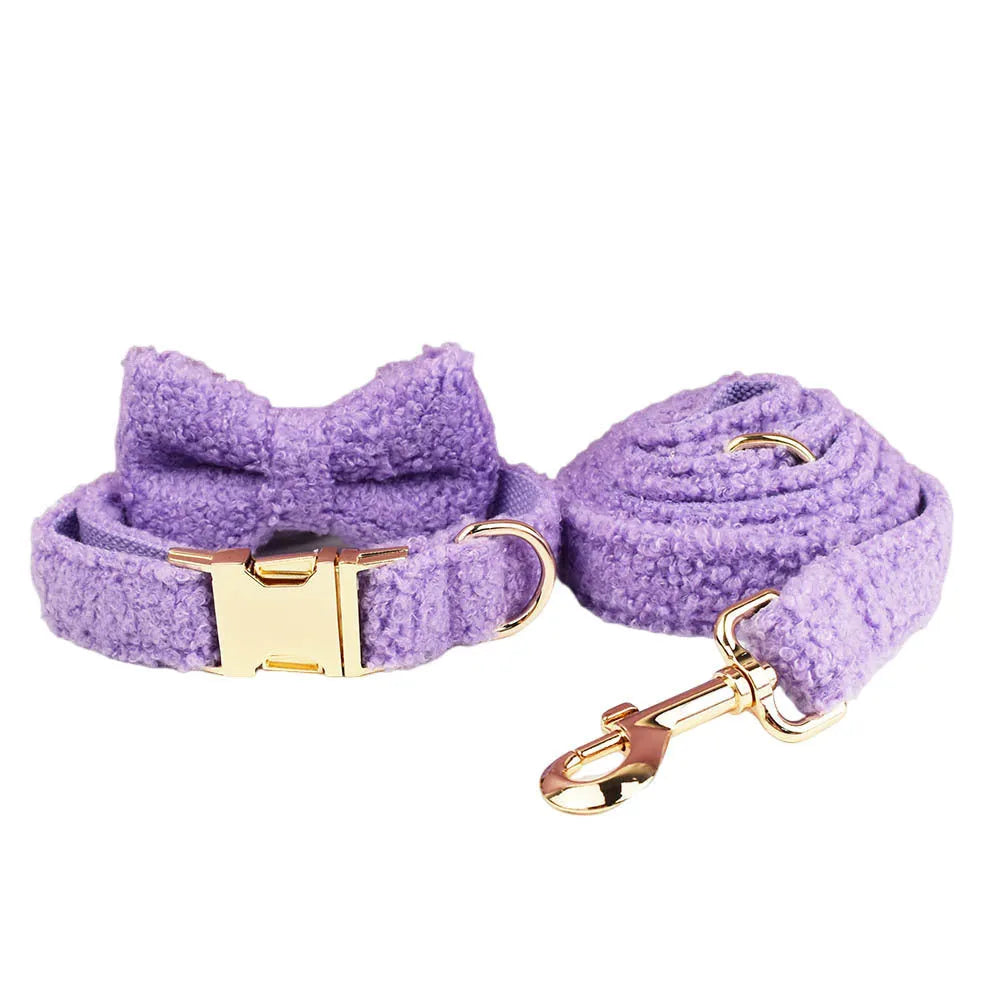 Four-piece dog accessory set showing collar, lead, bow and matching vest in cloth material