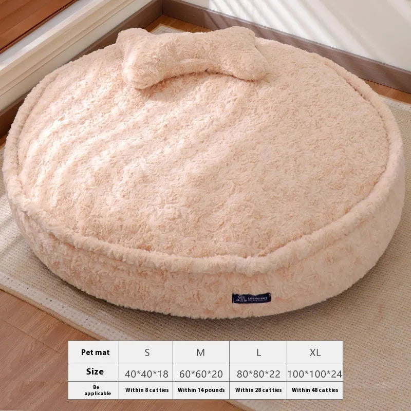 Milk tea colour round pet bed with a removable cloth cover on a wooden floor.