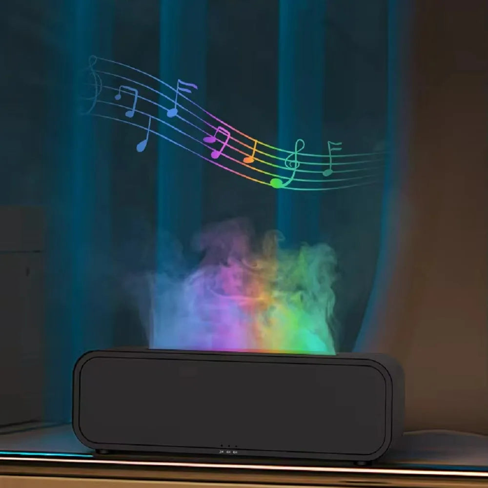 Black and white aroma diffuser with remote control showing colour-changing flame light effect