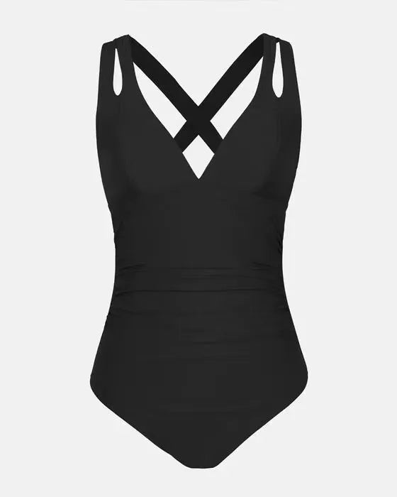 Solid colour one-piece swimsuit with triangle bikini top and cross shoulder straps.
