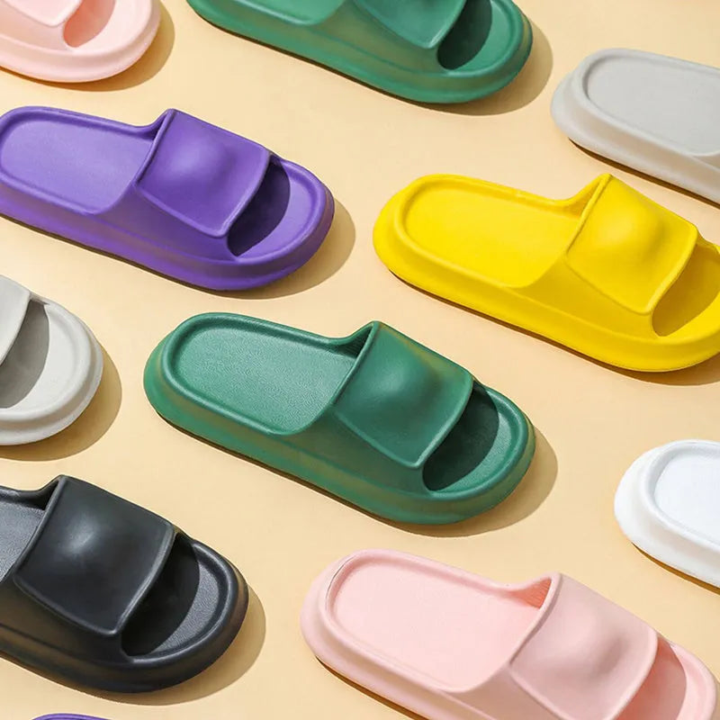 A pair of thick-soled EVA flip-flop slippers for men and women in a choice of seven colours.