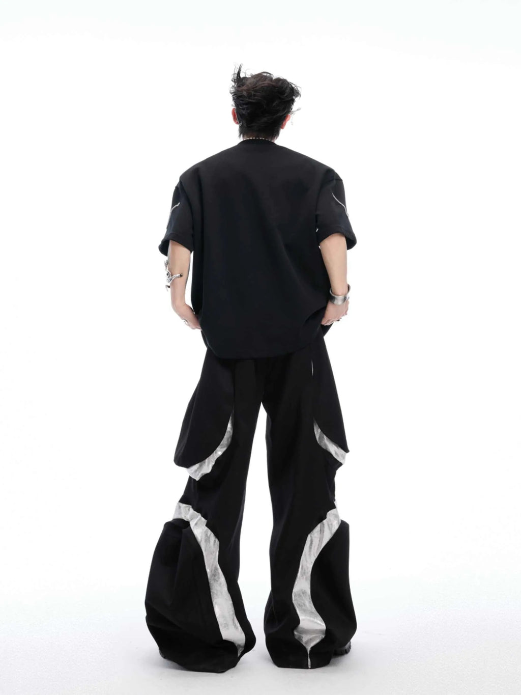 Black heavy cotton t-shirt with padded chain shoulder detail on short sleeves