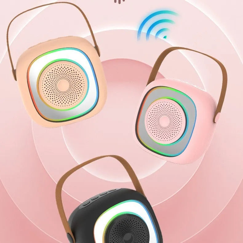 Wireless black and wheat coloured Bluetooth karaoke microphone with card slot and USB port.