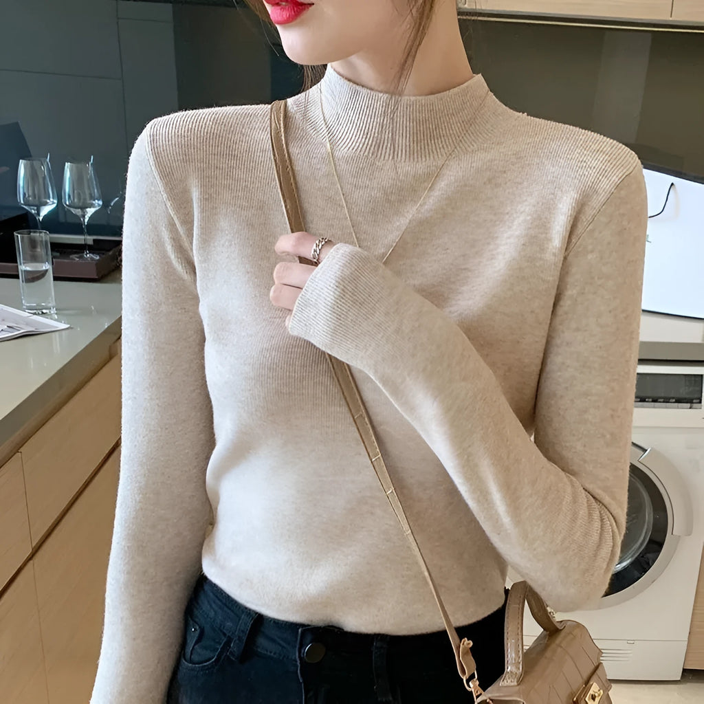 Slim fit long sleeve viscose knit shirt shown in a choice of colours including apricot, black, and mild blue.