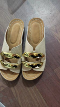 Solid colour Roman style platform flip-flops on a white background showing the artificial PU upper and rubber sole.