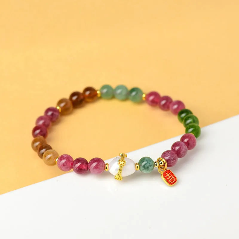 Geometric chalcedony bracelet with 6.5mm beads in optimised tourmaline colour Z054.