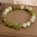 Original design women's bracelet with a green Xiuyan jade stone centrepiece.