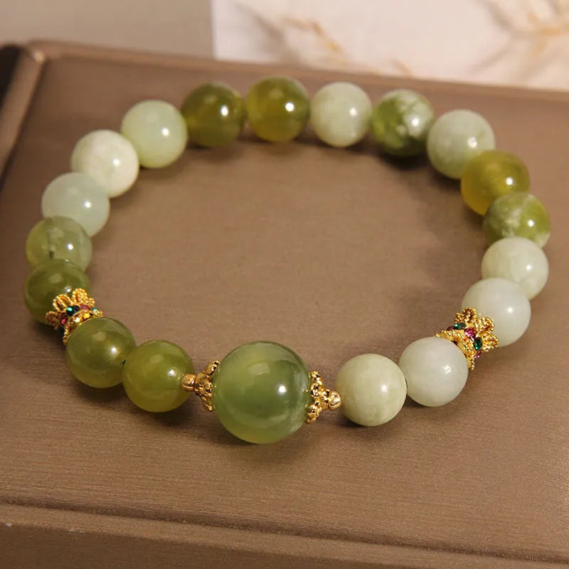 Original design women's bracelet with a green Xiuyan jade stone centrepiece.