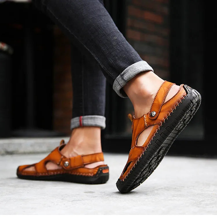 Men's closed toe sandals in black with rubber sole and adjustable slide strap