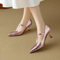Women's gun colour genuine leather Mary Jane pumps with a chunky heel and pointed toe.