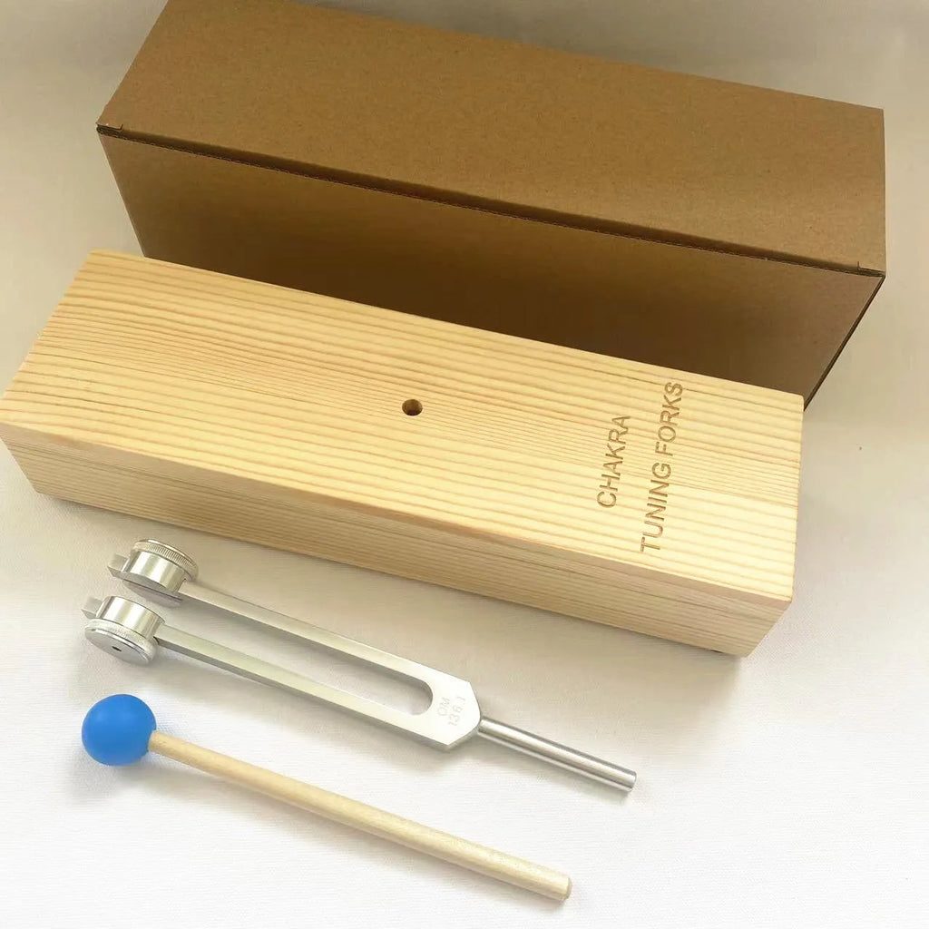 432Hz aluminium alloy tuning fork with speaker for sound therapy on kraft paper box