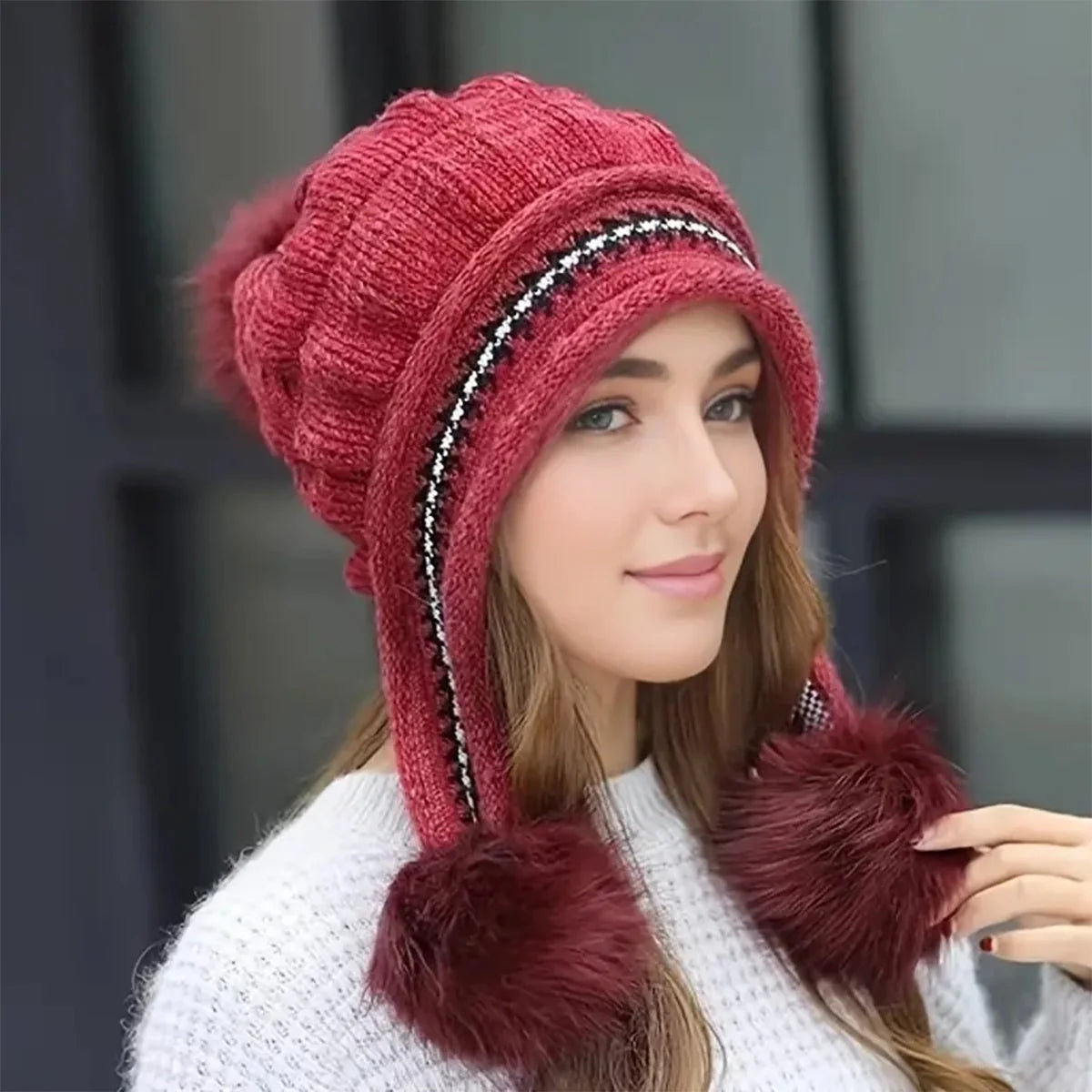 Knit fleece beanie with ear flaps and pompom in various colours for winter warmth