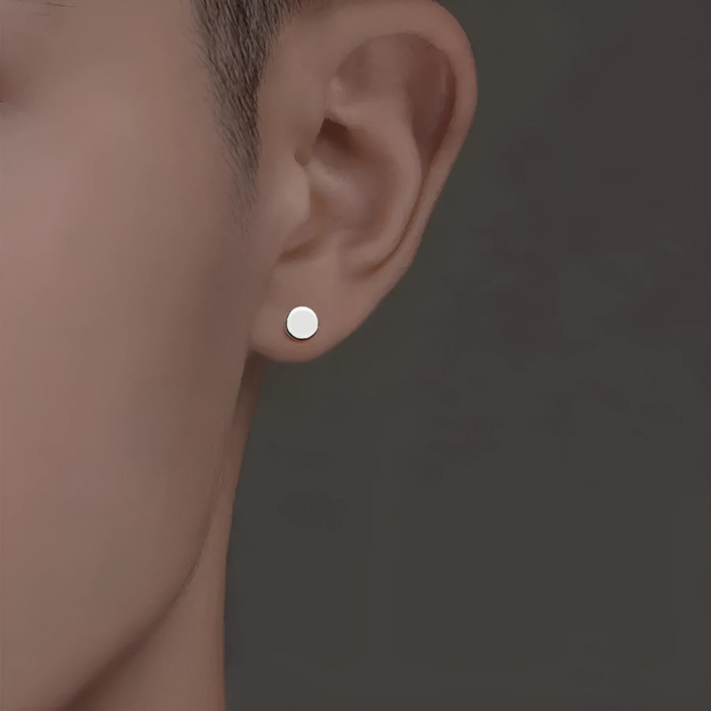 S999 sterling silver flat ear bone studs in geometric round design, showing silver and black colour options