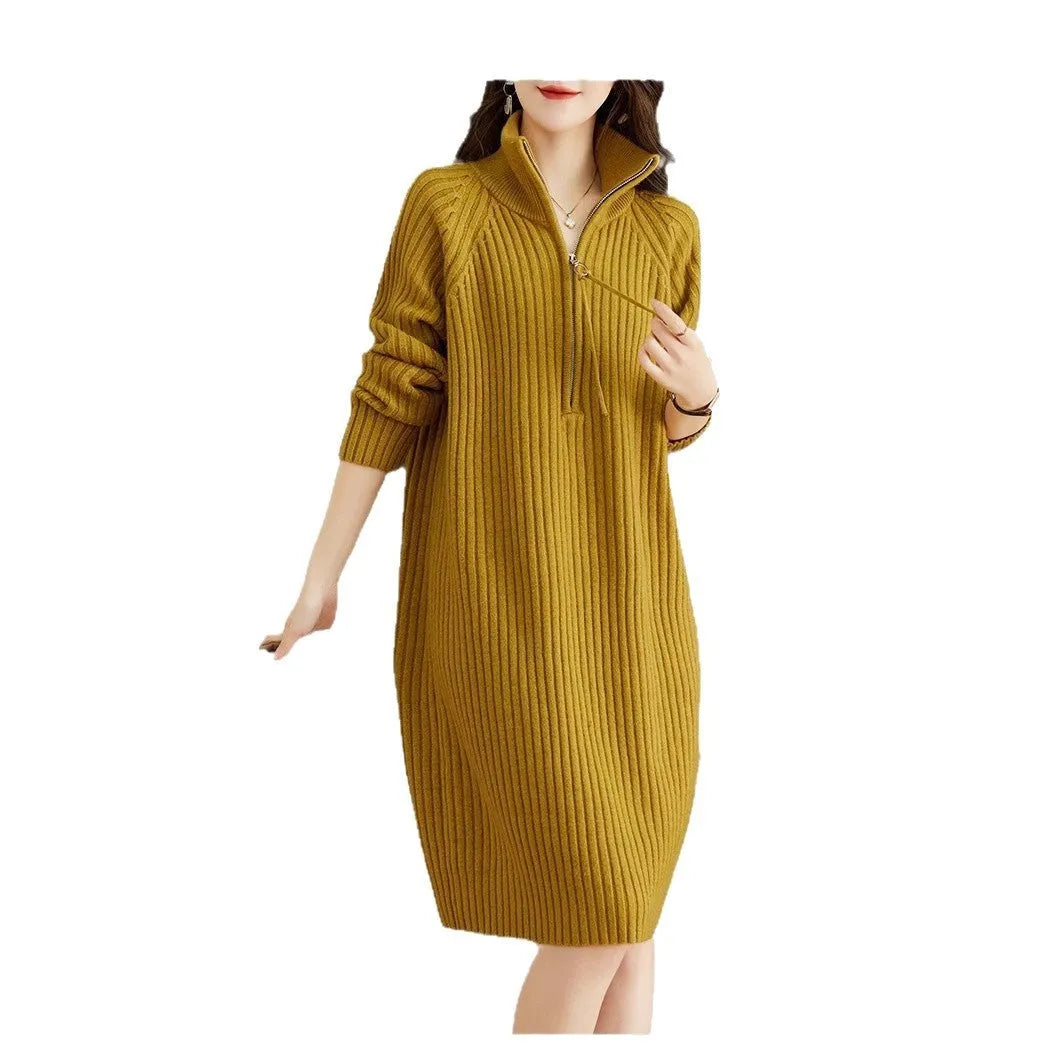 Beige half zip straight skirt with long sleeves and a stand collar, shown on a model.
