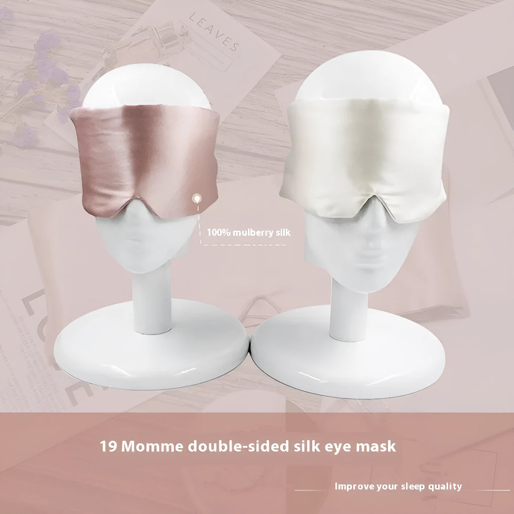 Mulberry silk sleep eye mask shown in champagne gold colour on a soft background.