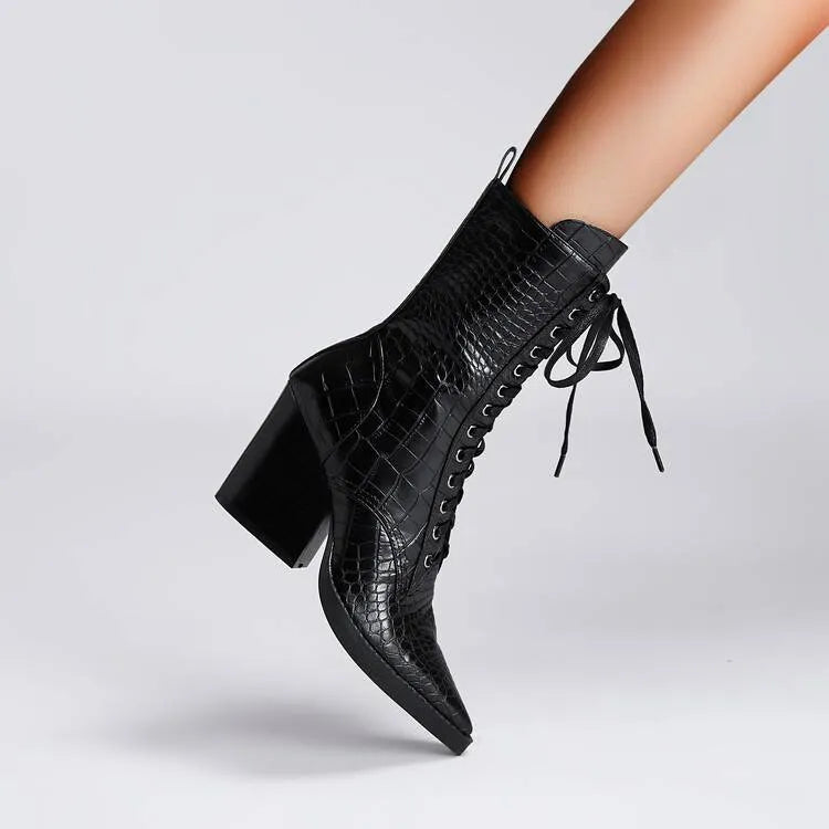 Dark brown women's ankle boot with retro stone pattern, pointed toe, and a chunky heel.