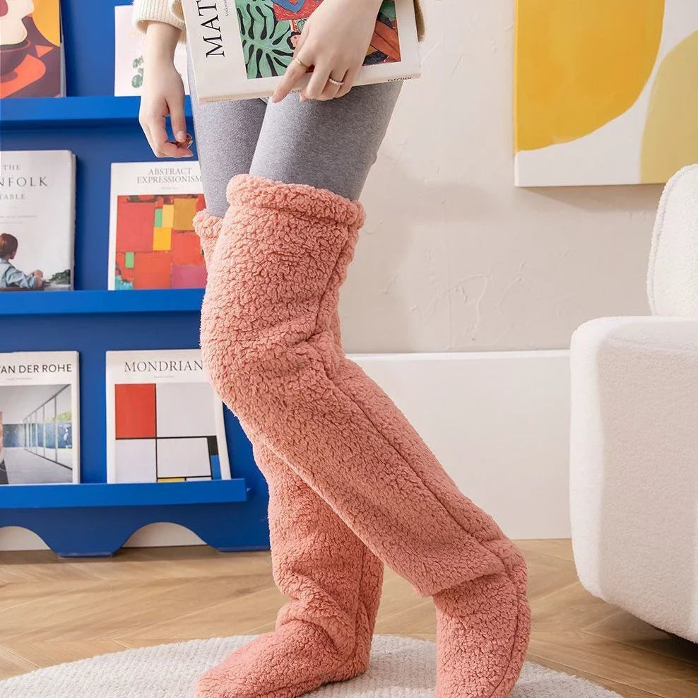 Cozy over-the-knee fuzzy socks in various colors, designed to keep your legs and knees warm during the winter season.