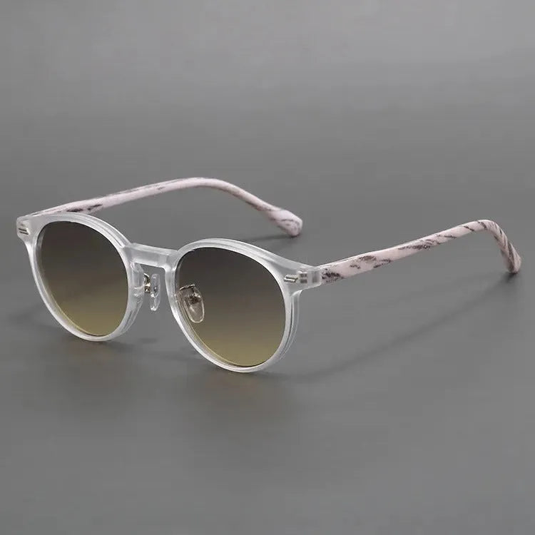 Retro style frosted round rim sunglasses shown in leopard print and grey colour options.