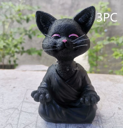 Charming ceramic Buddha cat figurine in black, grey, and orange colors for meditation, yoga, and home decor