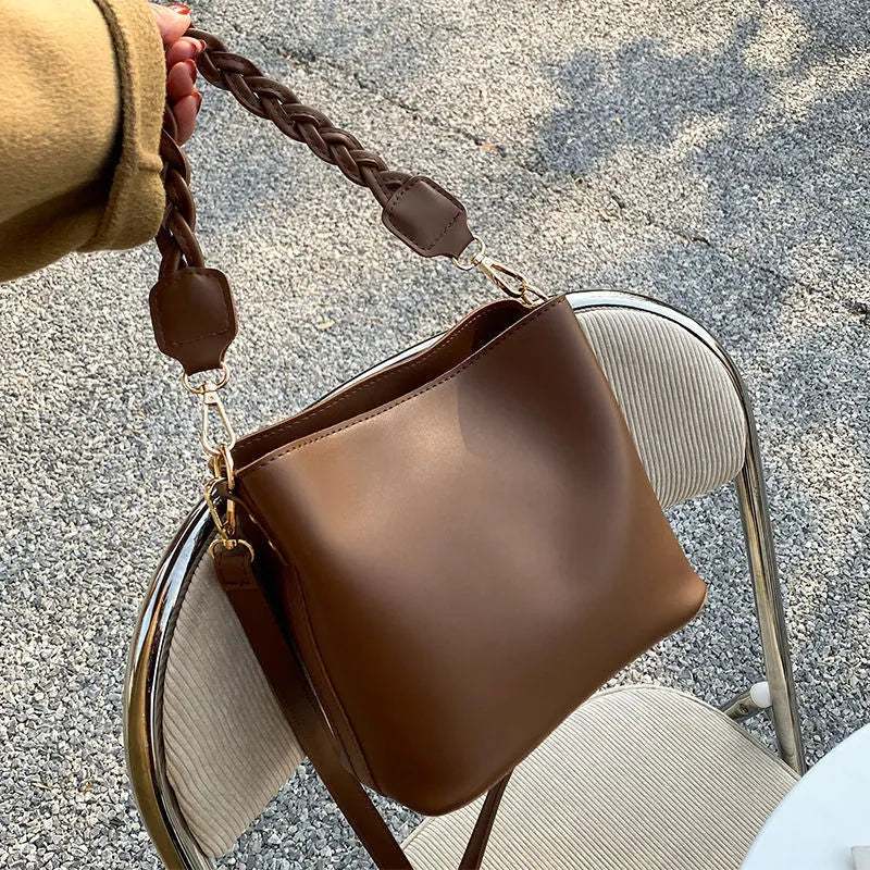 Retro woven PU one-shoulder crossbody underarm bucket bag in khaki colour.