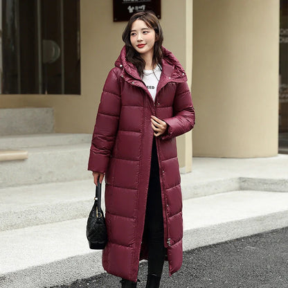 Women's super long winter puffer coat in black, dark red, white, and khaki with hood